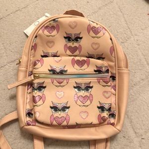 Pink owl mini backpack.